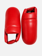 Absolute Force International red vinyl karate foot guards with foam cushioning for martial arts protection
